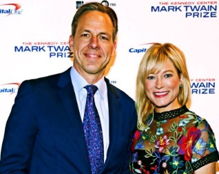 Jennifer Marie Brown during an event with her husband.